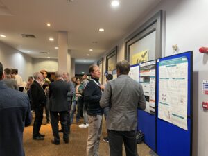 Participants networking at the poster exhibition