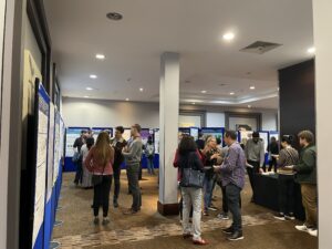 Participants networking at the poster exhibition